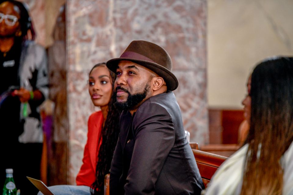 Banky W smiling in the audience
