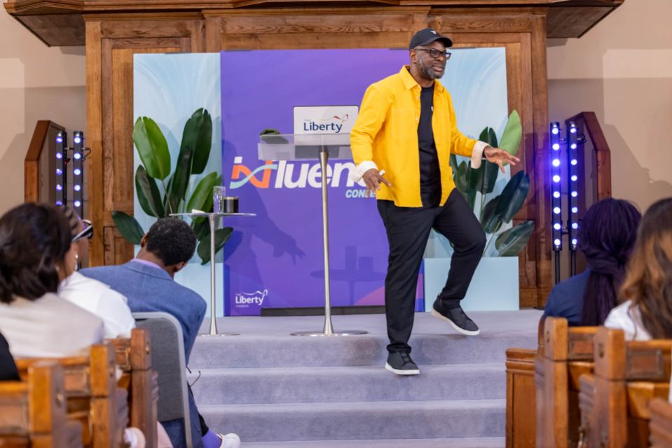 Dr Sola Fola-Alade on stage at a previous Influence